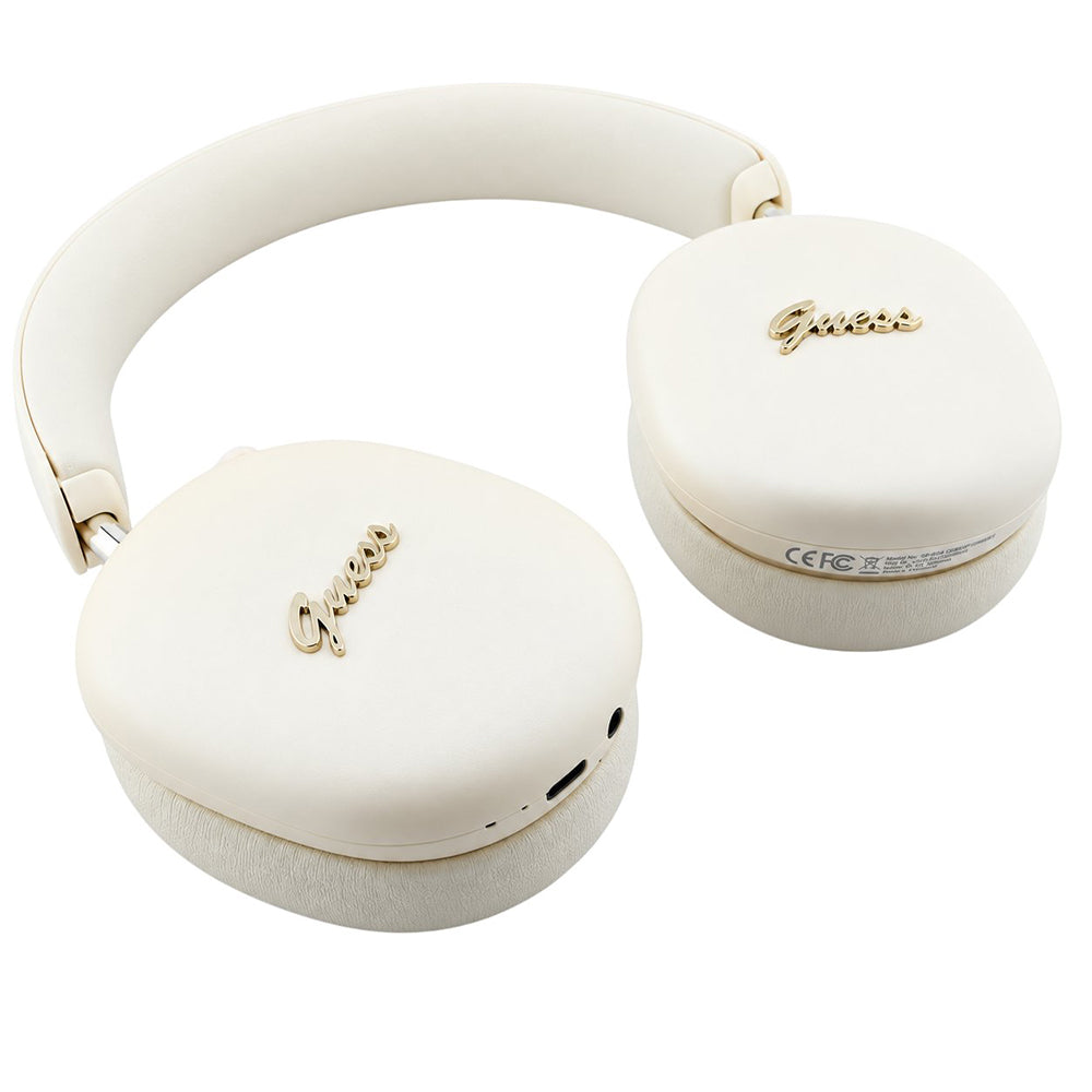 Căști GUESS Metal Script Logo bej cu cupele rotite și porturi vizibile